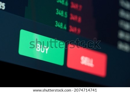 Buy or sell buttons concept. Close up computer screen view background of stock exchange market order online trading strategy choice of buying and selling crypto currency shares to get profit growth. Royalty-Free Stock Photo #2074714741