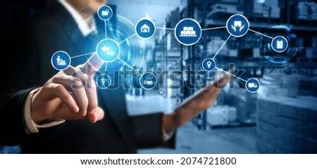 Smart warehouse management system with innovative internet of things technology to identify package picking and delivery . Future concept of supply chain and logistic network business . Royalty-Free Stock Photo #2074721800