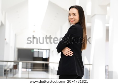 Portrait Of Successful A middle-aged Asian businesswoman smiling to camera