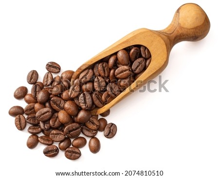 Coffee beans in the wooden scoop, isolated on white background, top view Royalty-Free Stock Photo #2074810510