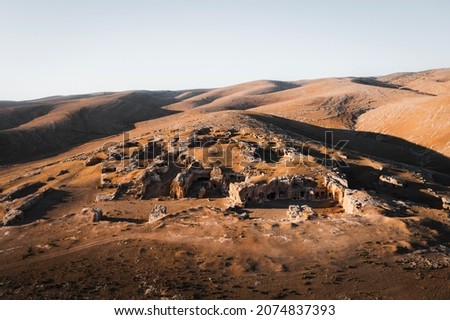 aerial geological shapes and ancient ruins view of the mardin