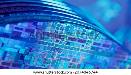 Macro of many silicon Wafer with semiconductors in box inside clean room Royalty-Free Stock Photo #2074846744