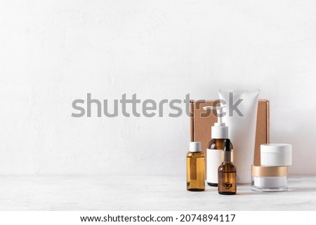 Skincare Beauty Products and Box on white table, assortment of cosmetics, healthy cosmetology, spa treatment concept, copy space.