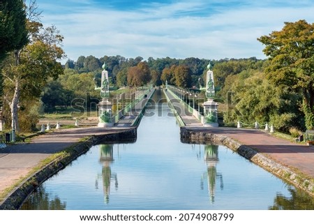 The Briare Aqueduct in central France carries a canal over the river Loire on its journey to the Seine. Royalty-Free Stock Photo #2074908799