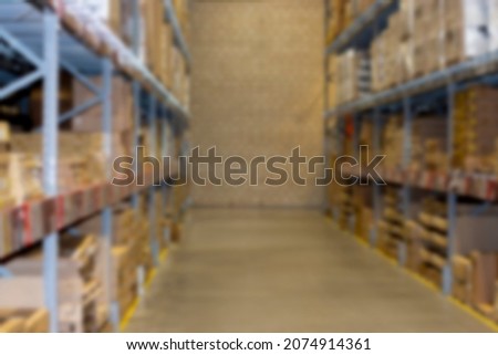 Defocus background photography warehouse. Industrial storage room with shelves and boxes
