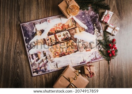 Advent calendar and gifts on wooden table background, Christmas advent calendar.
