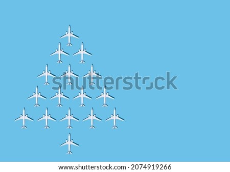 Christmas background. Christmas tree from planes. Postcard for airlines. An airport. Blue background with place for text Copy space. Pattern from planes on a blue background. Fly airline. Airplane.