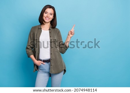 Photo of confident positive lady promoter point hands empty space demonstrate promo isolated over sky light color background