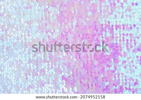 Pink and blue shiny sparkly sequins textured holiday background Royalty-Free Stock Photo #2074952158