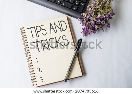 Conceptual display Tips And Tricks. Internet Concept means piece advice maybe suggestion how improve Empty Opened Journal With A Pen Beside A Keyboard And A Flower On Desk.