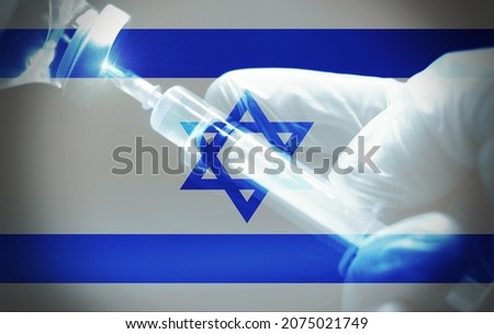 Syringe with the Israel flag as background, concept of 3rd dose of Vaccination in Israel.