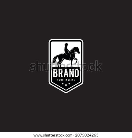Silhouette of racing horse with jockey Royalty-Free Stock Photo #2075024263