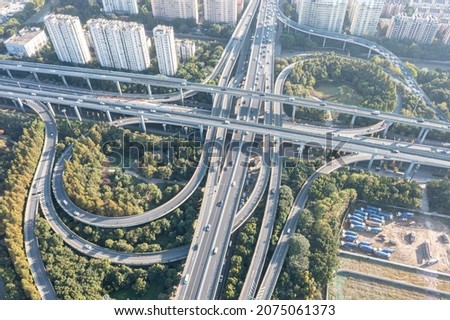 overpass with city skyline in hangzhou china