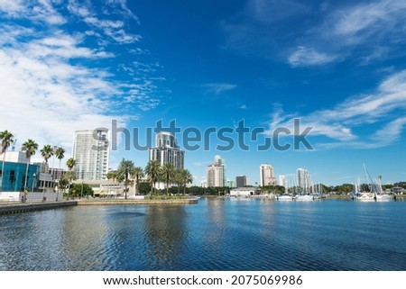 Embankment and marina with yachts. Sunny summer day with blue sky in St. Petersburg Florida.