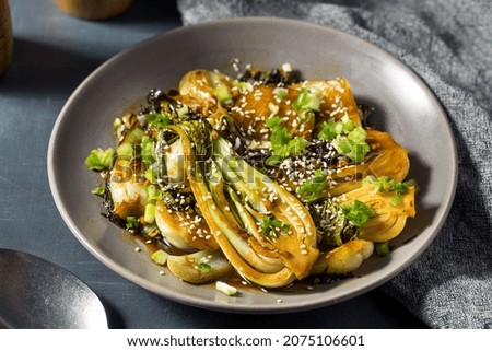 Homemade Asian Sauteed Soy Baby Bok Choy with Sesame Seeds Royalty-Free Stock Photo #2075106601