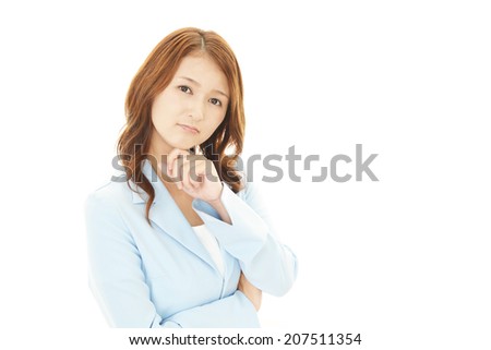 Depressed Asian business woman.