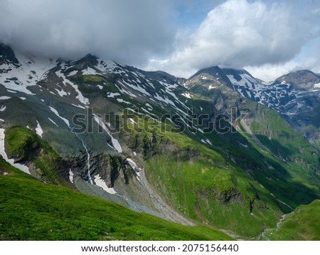 summer green Alps mountains in Austria with snowy peaks near Grossglockner