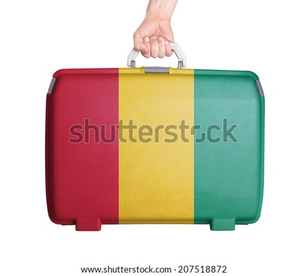 Used plastic suitcase with stains and scratches, printed with flag, Huinea