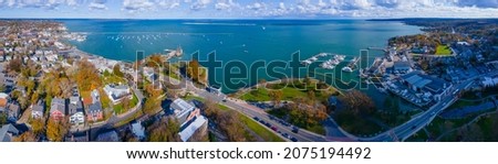 Plymouth Bay and Plymouth Village Historic District panoramic aerial view, including Antique ship Mayflower, in town center of Plymouth, Massachusetts MA, USA.  Royalty-Free Stock Photo #2075194492