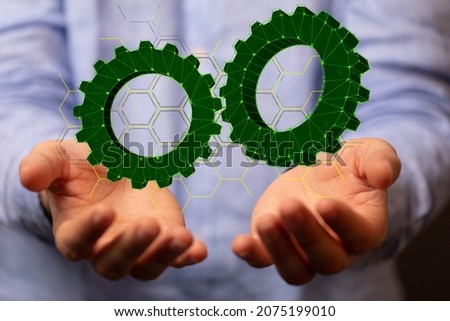 Above Some Gears and Close up on Three Small Green Gears