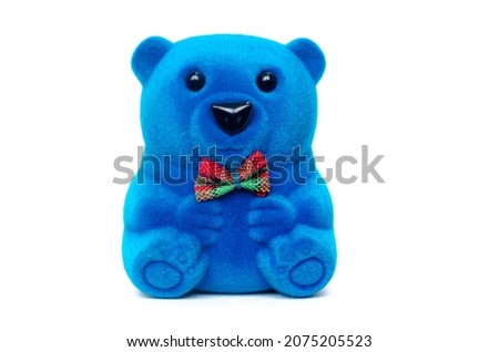 Blue teddy bear on a white background