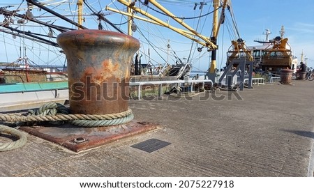 Ships and bollard, Wexford harbour Royalty-Free Stock Photo #2075227918