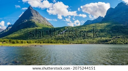 Innerdalsvatna Lake and the mountain peak of Innerdalstarnet. Innerdalen mountain valley of Norway.