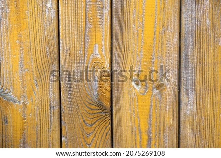 Yellow wooden background. Background from yellow boards. Wood texture