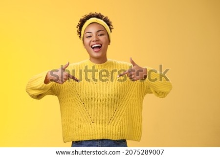 Confident good-looking outgoing black cute girl 20s in sweater headband afro hairstyle pointing heself raise head arrogant laughing bragging telling own personal goals achievements, suggest herself Royalty-Free Stock Photo #2075289007