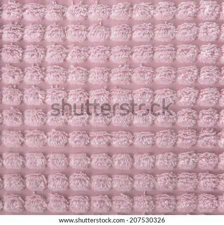 Cream coloured carpet background, close up