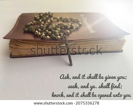 Quote from the bible text on image with my prayer book with the Holy Rosary background. High quality photo