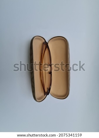 Brown glasses indoors on a white background