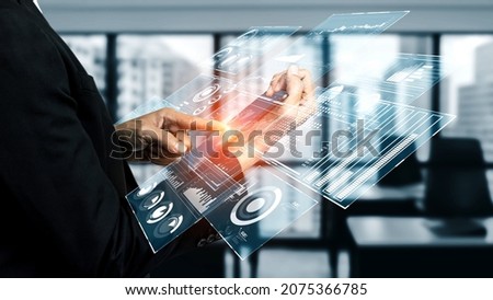 Business intelligence technology and big data analytic mixed media showing concept of futuristic information report using computer software to analyze strategic investment advice for decision making . Royalty-Free Stock Photo #2075366785