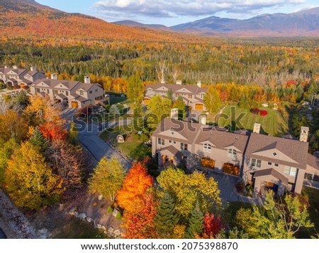 aerial view of residential building in autumn woods