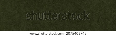 The texture of the dark olive velvet. The background of dark olive cloth. Luxury background of dark olive velvet. Military Green Royalty-Free Stock Photo #2075403745