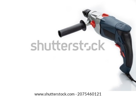 Professional tool electric drill isolated on white background. Electric hand tools
