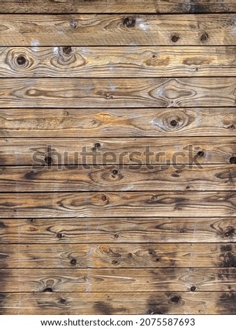 
Close-up of slats of pine, plywood, rustic, laminate, beech, oak with grooves and veins.