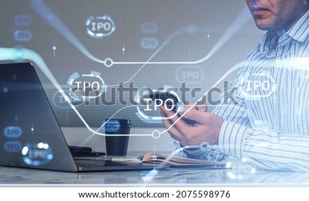 Office man hands typing on phone. Initial public offering hologram with lines, hud with glowing blocks and candlesticks. Concept of technology and e-business