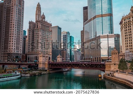Early morning view of the DuSable Bridge across the main stem of the Chicago River with skyscrapers in the background, Downtown Chicago, IL, USA Royalty-Free Stock Photo #2075627836