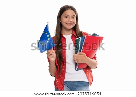 happy teen girl hold european union flag and workbook. schengen countries. touristic visa.