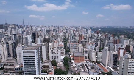 Aerial view of Jardins district in São Paulo, Brazil. Big residential and commercial buildings in a prime area near Av. Paulista with Ibirapuera Park on background.  Royalty-Free Stock Photo #2075774110