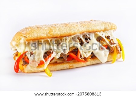 Philly cheese steak sandwich with roasted beef, pepper, caramelized onion, mushrooms and melted cheese on a white background Royalty-Free Stock Photo #2075808613