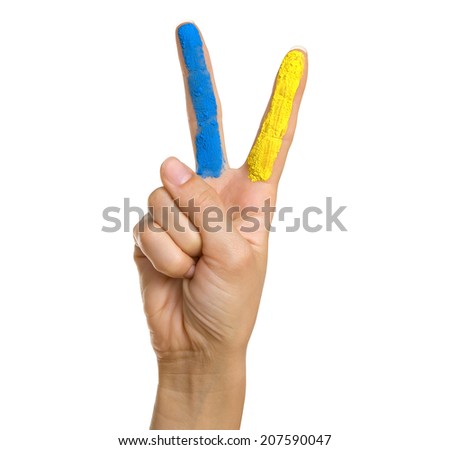 Woman Giving Peace (Victory) Sign with a Painted Ukraine flag Over White Background  