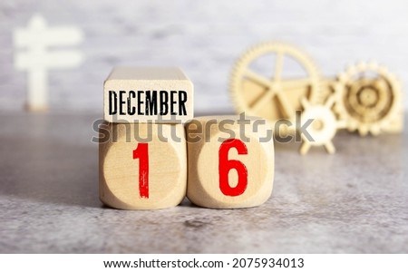 December 16th.December 16 white wooden calendar on vintage wood abstract background. New year at work concept. Winter time. Copyspace for your text.