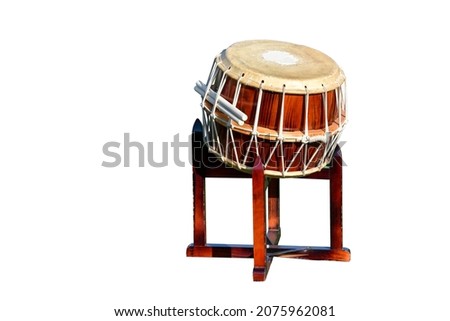 big ethnic drum on a stand isolated on white