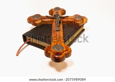 The book of the Holy Gospel (psalter, holy scripture, prayer book) and the Orthodox cross. Royalty-Free Stock Photo #2075989084