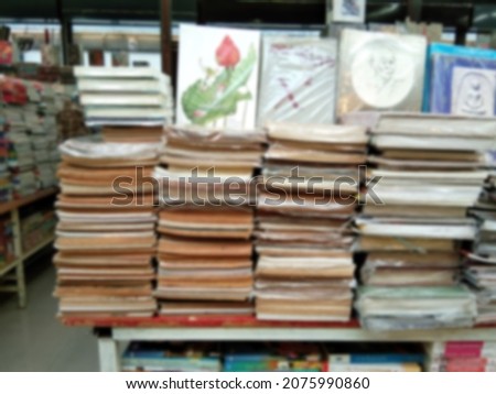 Picture blur of 2nd hand book shelf For those who want cheap books in a flea market selling antiques in Thailand.