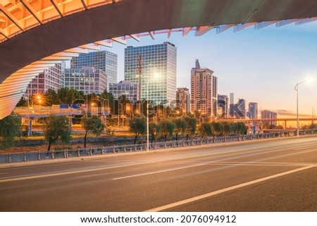 The skyline of modern urban buildings, asphalt roads and night scenery in Beijing, the capital of China