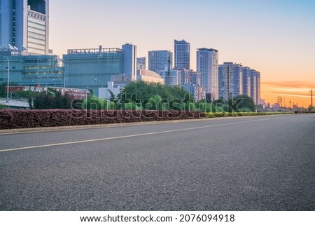 The skyline of modern urban architecture, asphalt road and Zhaoxia in Beijing, the capital of China