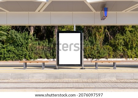 Poster stand. Street billboard mock up at a public transport stop.